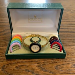 Vintage Gucci 1100 Series Watch with 12 interchangeable bezels in colors shown